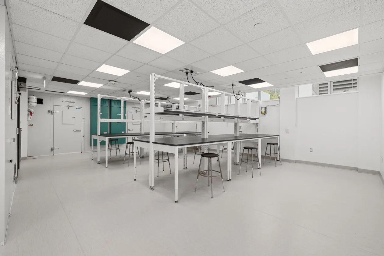 UBC FSIAP lab renovation — research lab with island benches, stools and teal casework