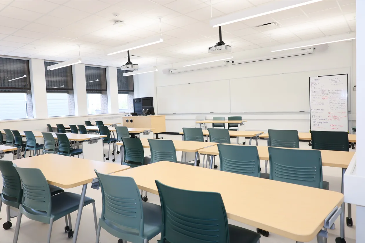 Teaching classroom with new furniture and writing wall after renovation, UBC MacMillan Building.