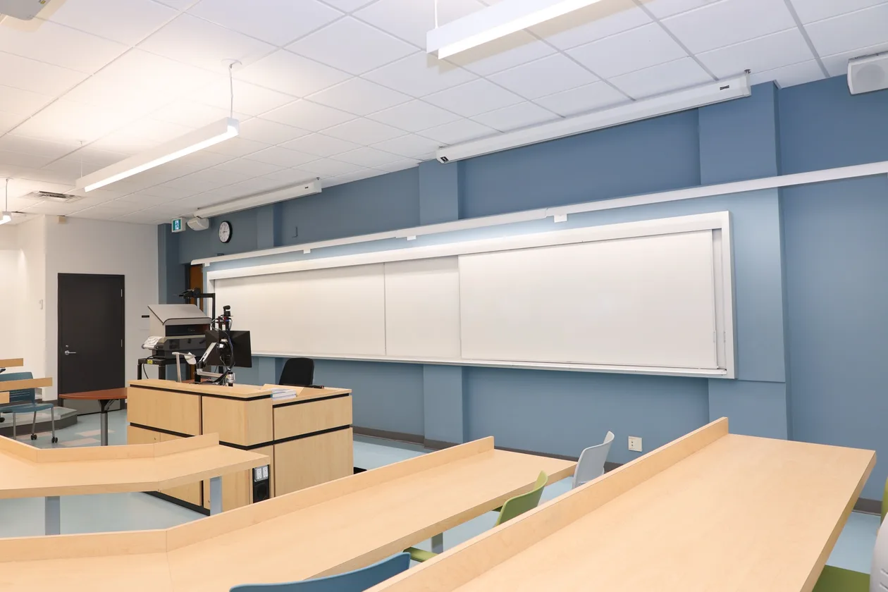 Teaching lab with fixed demonstration benching and new finishes, UBC MacMillan Building.